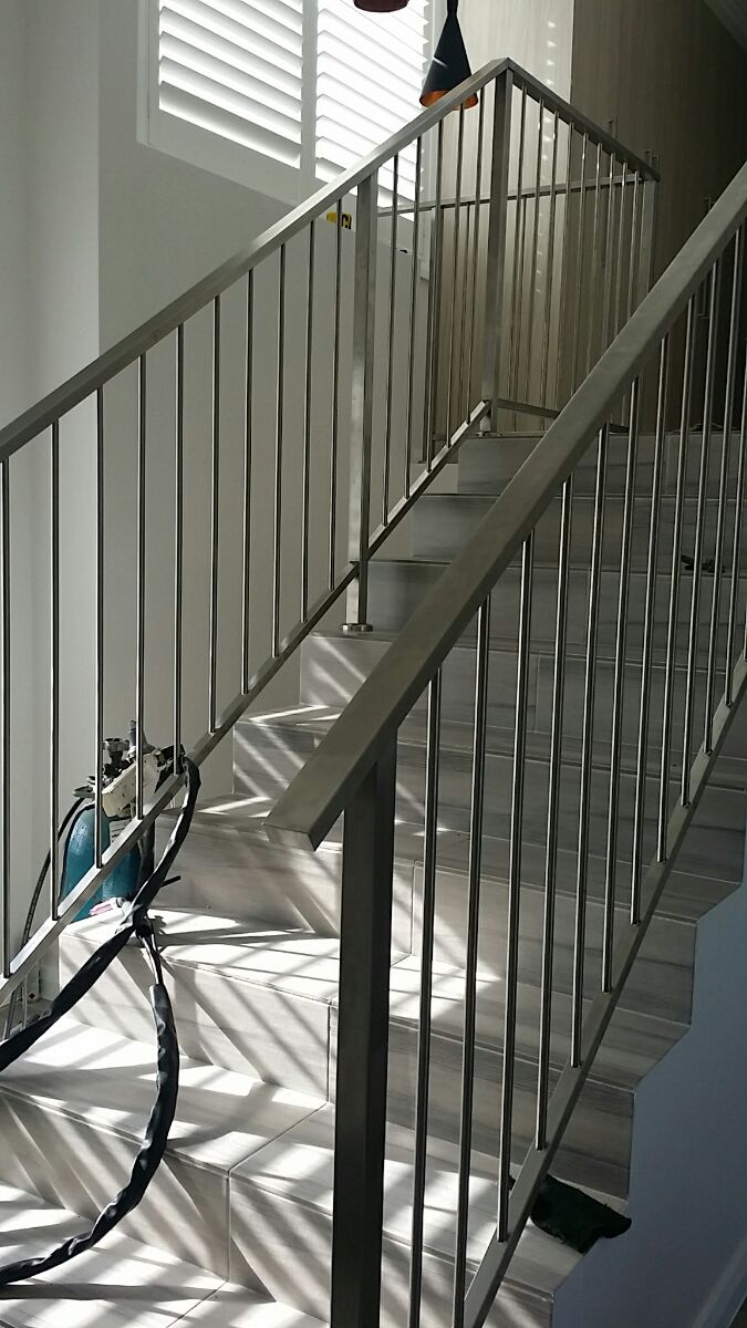 construction Stainless steel balustrade and Colorbond fence
